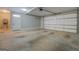 Clean, spacious garage with modern door and ample room for vehicles and storage at 5118 N Pratt St, Covington, GA 30014