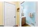 Charming half bath with modern vanity and decorative accents at 115 Wellborn Chase, Fayetteville, GA 30215