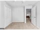 Bedroom with neutral colored carpet and freshly painted white walls with natural light at 115 Wellborn Chase, Fayetteville, GA 30215