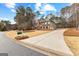 Exterior view of the property, showing the front yard and driveway at 115 Wellborn Chase, Fayetteville, GA 30215
