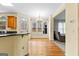 Bright dining area with hardwood floors and access to the kitchen at 115 Wellborn Chase, Fayetteville, GA 30215