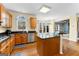 Well-appointed kitchen with granite counters, stainless steel appliances, and natural light at 115 Wellborn Chase, Fayetteville, GA 30215