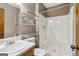 Bathroom featuring neutral paint, updated sink, vanity, and standing shower at 979 Walnut Creek Ln, Jonesboro, GA 30238