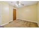 Bedroom featuring ceiling fan, plush carpet, and neutral paint at 979 Walnut Creek Ln, Jonesboro, GA 30238