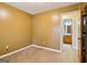 Cozy bedroom showcasing carpeted floors and an ensuite bathroom at 979 Walnut Creek Ln, Jonesboro, GA 30238
