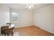 Bedroom with wood floor and natural light and a double closet at 9163 Retreat Pass, Jonesboro, GA 30236