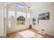 Bright sunroom with large windows, white shutters, and ample natural light at 9163 Retreat Pass, Jonesboro, GA 30236