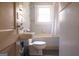 Functional bathroom with a vintage style sink, toilet, and a tub with shower at 2791 Pearl St, East Point, GA 30344