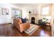Inviting living room with fireplace, hardwood floors, and stylish decor at 2791 Pearl St, East Point, GA 30344