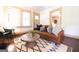 Warm and welcoming living room with modern furniture, a cozy rug and natural light at 2791 Pearl St, East Point, GA 30344