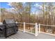Relaxing deck area with a grill, perfect for outdoor entertaining at 220 Terrane Rdg, Peachtree City, GA 30269