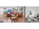 Spacious living room with a large leather sofa and exercise equipment at 220 Terrane Rdg, Peachtree City, GA 30269