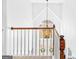 Elegant staircase featuring a decorative chandelier and natural light at 220 Terrane Rdg, Peachtree City, GA 30269