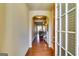 Inviting foyer featuring hardwood floors and an arched entryway leading into the living space at 2325 Thackery Rd, Snellville, GA 30078