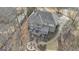 Aerial view displaying the home's deck, patio, fire pit area and manicured landscaping at 804 Carnellian Ln, Peachtree City, GA 30269