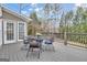 Charming back deck with outdoor seating, perfect for enjoying the surrounding nature at 804 Carnellian Ln, Peachtree City, GA 30269