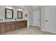 Double vanity with granite countertop and tiled flooring at 804 Carnellian Ln, Peachtree City, GA 30269