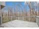 Balcony view showcasing the scenic surroundings, clear blue skies, and a display of bare trees at 1320 Kay Se Ter, Conyers, GA 30013