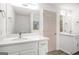 Spacious bathroom features double vanities with quartz countertops, enhancing the modern aesthetic and functionality at 1320 Kay Se Ter, Conyers, GA 30013