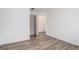 Bedroom showcases wood-look flooring, a closet, and a door, offering a modern appeal at 1320 Kay Se Ter, Conyers, GA 30013
