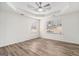 Spacious bedroom features hardwood floors, a ceiling fan, and large windows offering ample natural light at 1320 Kay Se Ter, Conyers, GA 30013