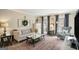Comfortable living room with stylish furniture, neutral tones, and natural light creating a warm and inviting atmosphere at 302 Cumberland Ct, Peachtree City, GA 30269