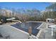 Large, covered community pool area with a slide and cabana for relaxing poolside at 302 Cumberland Ct, Peachtree City, GA 30269