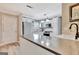 Bright kitchen with white cabinetry, stylish countertops, and stainless steel appliances at 498 N Jeff Davis Dr, Fayetteville, GA 30214