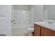 Bathroom featuring a shower-tub combo and vanity at 1915 Grove Way, Hampton, GA 30228