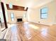 Spacious living room with a stone fireplace and wood-paneled vaulted ceiling at 304 Chestatee Ct, Woodstock, GA 30188