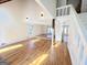 A brightly lit living area with light hardwood floors at 304 Chestatee Ct, Woodstock, GA 30188