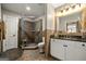 Stylish bathroom with a glass-enclosed shower, modern vanity, and decorative accents at 300 Annelise Park Dr, Fayetteville, GA 30214
