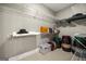 Walk-in closet with metal shelving and rods with boxes, bags and hats on display at 300 Annelise Park Dr, Fayetteville, GA 30214