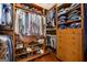 Walk-in closet with custom wood shelving, drawers, and organized storage for clothing and accessories at 300 Annelise Park Dr, Fayetteville, GA 30214