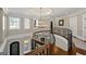 Elegant foyer with chandelier lighting and curved staircase at 300 Annelise Park Dr, Fayetteville, GA 30214