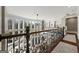 Spacious foyer with large windows, hardwood floors and iron railing at 300 Annelise Park Dr, Fayetteville, GA 30214