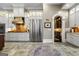 Spacious kitchen with stainless appliances and stone flooring at 300 Annelise Park Dr, Fayetteville, GA 30214
