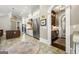 Spacious kitchen with large island, stainless steel appliances, and stone flooring at 300 Annelise Park Dr, Fayetteville, GA 30214