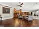Comfortable living room with hardwood floors, dartboard, and convenient access to the bar at 300 Annelise Park Dr, Fayetteville, GA 30214