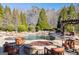 Beautiful pool area with a fire pit and seating at 300 Annelise Park Dr, Fayetteville, GA 30214