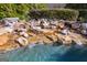 Stunning rock waterfall feature enhances the pool's beauty at 300 Annelise Park Dr, Fayetteville, GA 30214