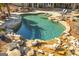 Beautiful pool featuring a natural rock border and clear blue water for ultimate relaxation at 300 Annelise Park Dr, Fayetteville, GA 30214