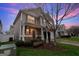 Inviting two-story home with covered porch, American flag, and lush landscaping at 70 High Point Way, Hiram, GA 30141