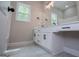 Bathroom featuring double sink vanity with white cabinets and stylish black hardware at 3264 Greenhill Ct, Villa Rica, GA 30180