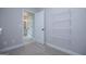 Bedroom closet with wire shelving, adjacent to a bathroom at 3264 Greenhill Ct, Villa Rica, GA 30180