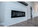 Modern fireplace with a shiplap surround and wood mantle in a living area at 3264 Greenhill Ct, Villa Rica, GA 30180