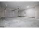 Bright and clean two-car garage with concrete floor at 3264 Greenhill Ct, Villa Rica, GA 30180