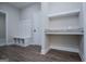 Hallway view with wooden floor and storage with granite top at 3264 Greenhill Ct, Villa Rica, GA 30180