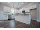 Bright kitchen featuring recessed lights, a stainless steel dishwasher, and white cabinets at 3264 Greenhill Ct, Villa Rica, GA 30180