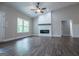 Living area with a modern fireplace, ceiling fan, and vaulted ceiling at 3264 Greenhill Ct, Villa Rica, GA 30180